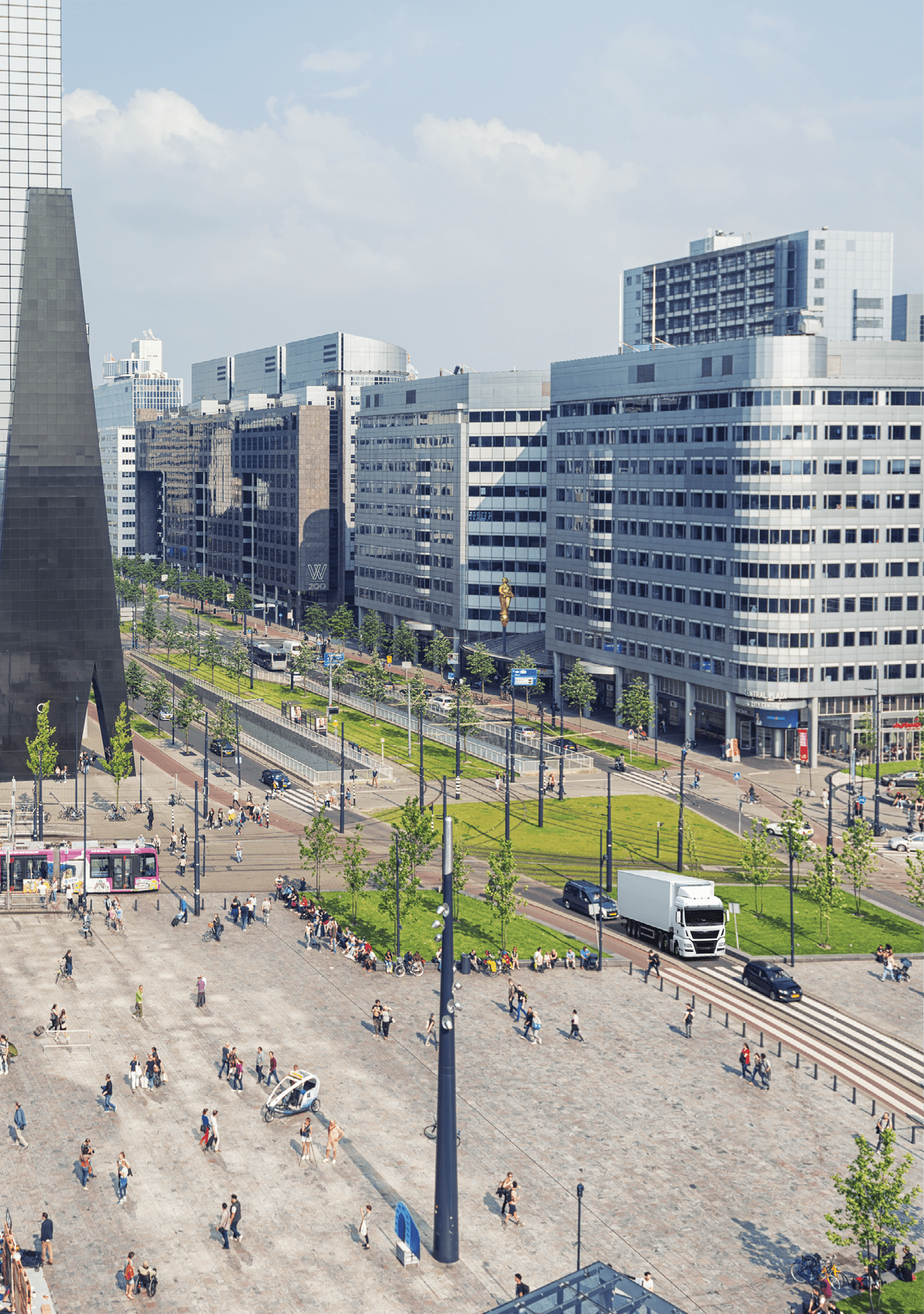Aerial view of Rotterdam Station Square during a sunny summer day. Letterbox format used.