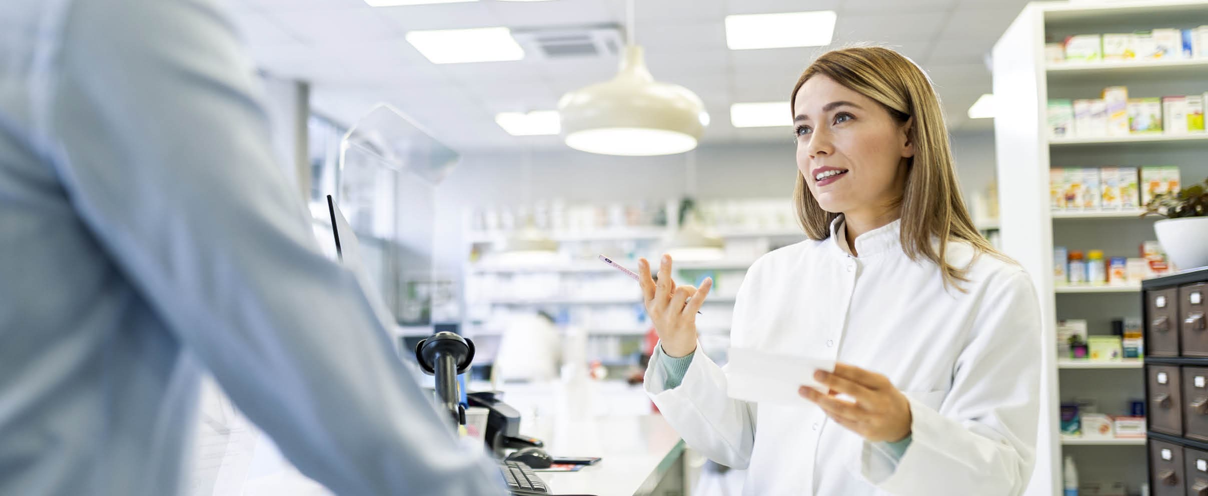 Pharmacist working in drugstore