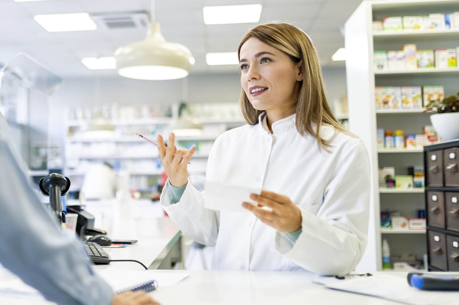 Pharmacist working in drugstore